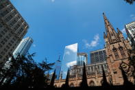 <p>The original World Trade Center towers can no longer be seen from the Trinity Church Cemetery in lower Manhattan, Aug. 13, 2017. (Photo: Gordon Donovan/Yahoo News) </p>