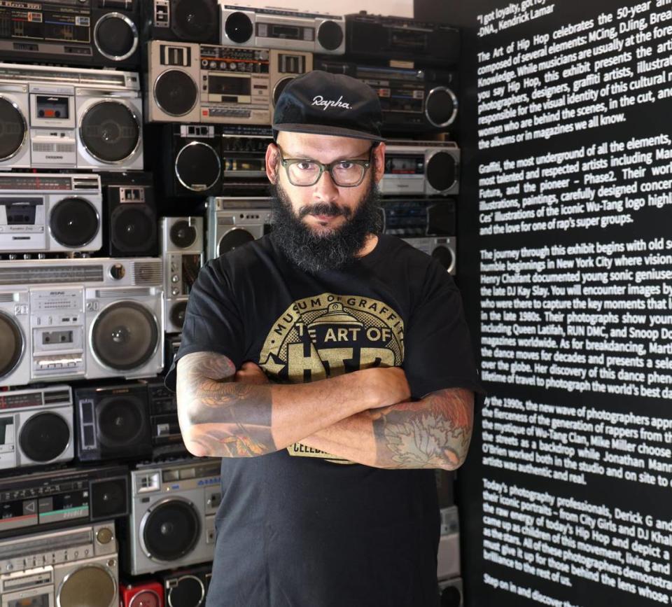 Co-founder and curator of the Art of Hipo-Hop, Alan Ket, is photographed among the museum’s collection of boom boxes.