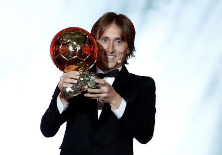 Soccer Football - 63rd Ballon d'Or - The Grand Palais, Paris, France - December 3, 2018 Real Madrid's Luka Modric with the Ballon d'Or award REUTERS/Benoit Tessier