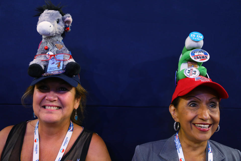 Cindy Trigg (L) and Theresa Navarro both of Nevada wear hats decorated with plush toys during day two of the Democratic National Convention at Time Warner Cable Arena on September 5, 2012 in Charlotte, North Carolina. (Photo by Joe Raedle/Getty Images)