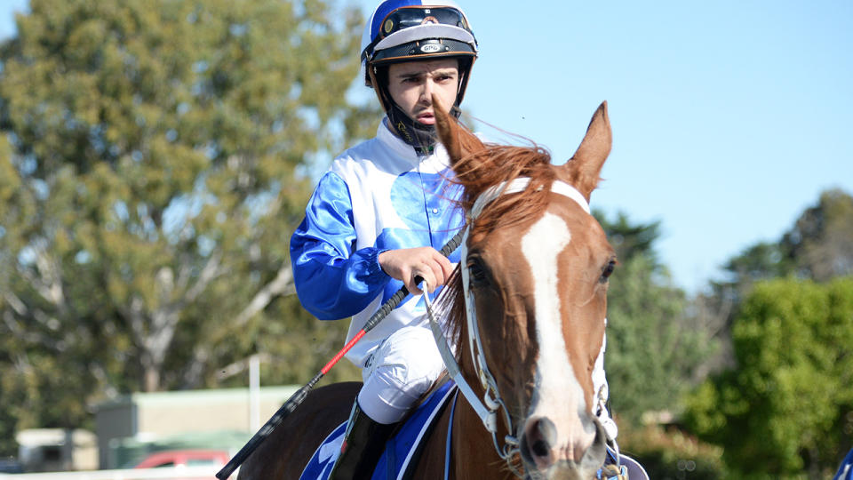 Chris Caserta, pictured here after winning the bet365 Top Tote Plus BM58 Handicap at Bairnsdale Racecourse in 2020.