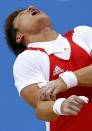 South Korea's Jaehyouk Sa shouts after getting injured on the men's 77Kg Group A weightlifting competition at the ExCel venue at the London 2012 Olympic Games August 1, 2012. REUTERS/Grigory Dukor (BRITAIN - Tags: SPORT OLYMPICS SPORT WEIGHTLIFTING)