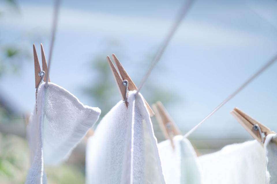 close up of clothes drying on clothesline