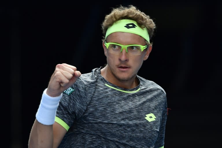 Uzbekistan's Denis Istomin reacts after a point against Serbia's Novak Djokovic during their match on day four of the Australian Open in Melbourne on January 19, 2017