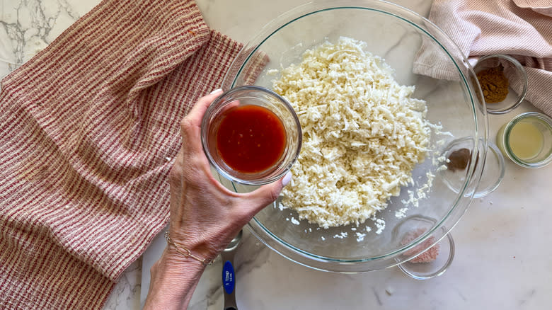 adding salsa to bowl