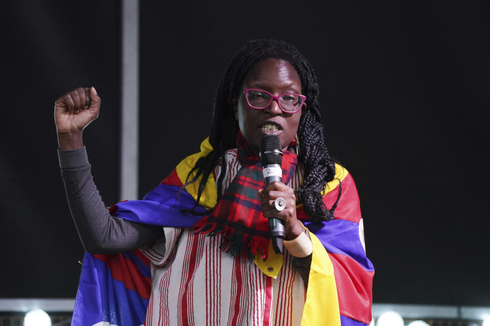 Namibia's climate activist Ina-Maria Shikongo speaks on the stage of a demonstration in Glasgow, Scotland, Friday, Nov. 5, 2021 which is the host city of the COP26 U.N. Climate Summit. The protest was taking place as leaders and activists from around the world were gathering in Scotland's biggest city for the U.N. climate summit, to lay out their vision for addressing the common challenge of global warming. (AP Photo/Jon Super)