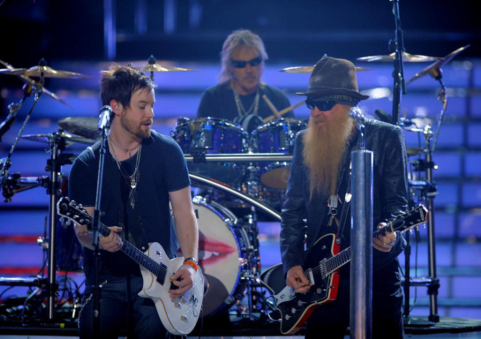 David Cook performs on stage with ZZ Top during the grand finale of "American Idol" Season 7.