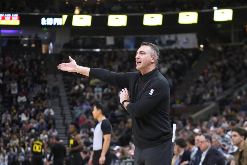 Toronto Raptors coach Darko Rajakovic gestures during the first half of an NBA basketball game against the Utah Jazz on Friday, Jan. 12, 2024, in Salt Lake City. (AP Photo/Rick Bowmer)