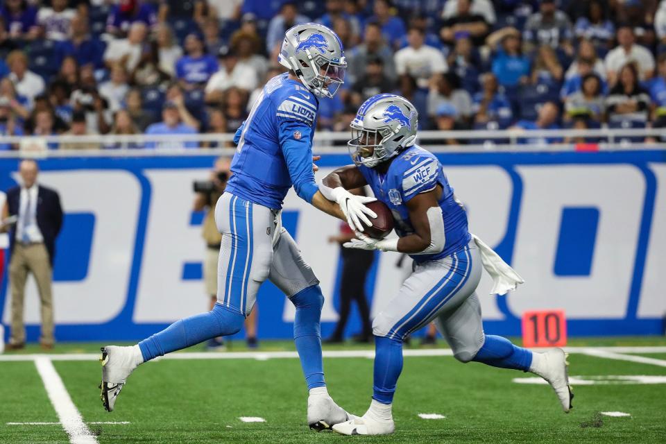 Detroit Lions quarterback Nate Sudfeld (10) passes the ball to running back Mohamed Ibrahim (33) against the New York Giants during the first half of a preseason game at Ford Field in Detroit on Friday, Aug. 11, 2023.