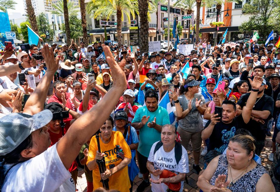 Demonstrators gather to protest the new controversial immigration law, SB 1718, that was signed into law by Florida Governor Ron DeSantis. Hundreds gathered and marched in downtown West Palm Beach, Florida on June 1, 2023.