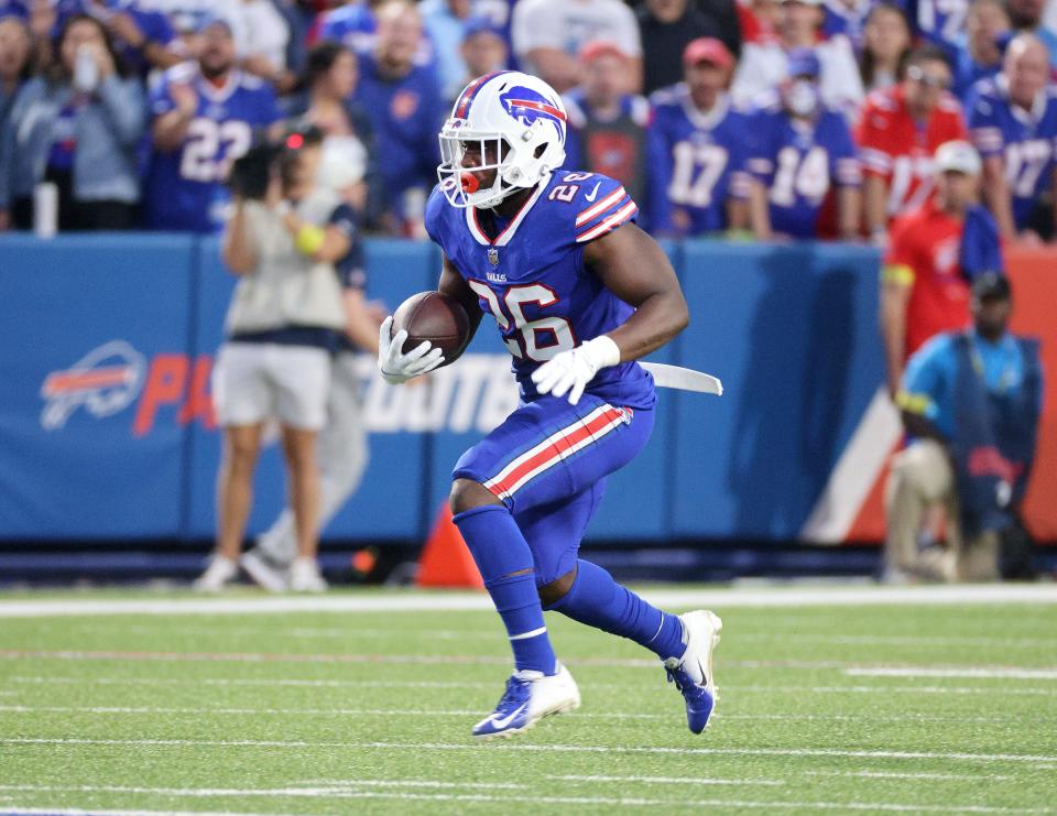 Bills running back Devin Singletary finds room to run. 