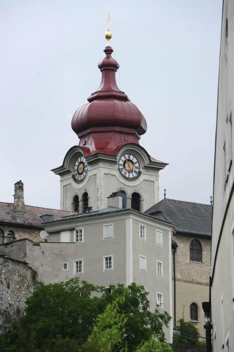 The steeple of Benedictine nuns Nonntal abbey church rises above the surrounding. The Benedictine nuns abbey was founded in 713 A.D. and is located at hill Moenchsberg.