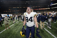 Michigan tight end Joel Honigford (84) celebrates at the end of the Big Ten championship NCAA college football game against Iowa, Saturday, Dec. 4, 2021, in Indianapolis. Michigan won 42-3. (AP Photo/AJ Mast)