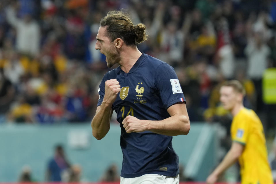 France's Adrien Rabiot celebrates after scoring his side's opening goal during the World Cup group D soccer match between France and Australia, at the Al Janoub Stadium in Al Wakrah, Qatar, Tuesday, Nov. 22, 2022. (AP Photo/Francisco Seco)