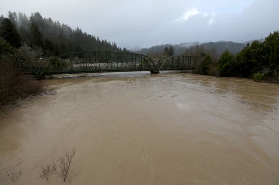 The Russian River flows under the old Guerneville Bridge