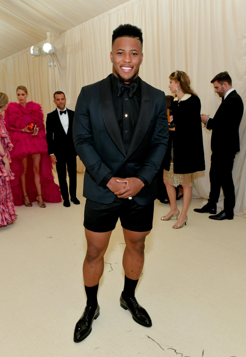 Saquon Barkley met Tom Brady, who doesn't seem to be able to make small talk, at the Met Gala. (Photo by Mike Coppola/MG19/Getty Images for The Met Museum/Vogue )