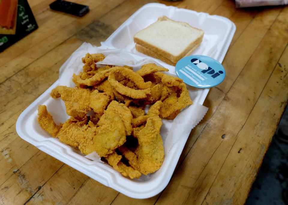 Fried Copi strips prepared at Carter's Fish Market Friday, March 24, 2023.