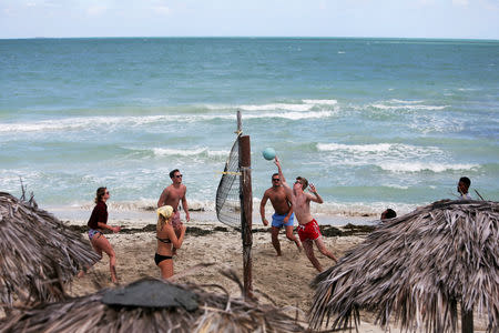 Tourists play volleyball at the beach in Varadero, Cuba, December 7, 2018. Picture taken December 7, 2018. REUTERS/Fernando Medina