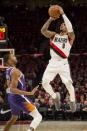 Dec 6, 2018; Portland, OR, USA; Portland Trail Blazers guard Damian Lillard (0) is fouled by Phoenix Suns forward Mikal Bridges (25) during the second half at Moda Center. The Trail Blazers beat the Suns 108-86. Troy Wayrynen-USA TODAY Sports