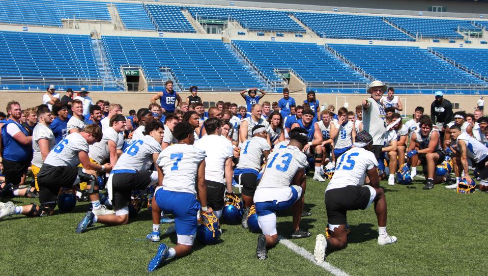 Coach John Stiegelmeier talks to the South Dakota State football team at the end of their first practice in 2022, Friday, Aug. 5 at Dana J. Dykhouse Stadium.