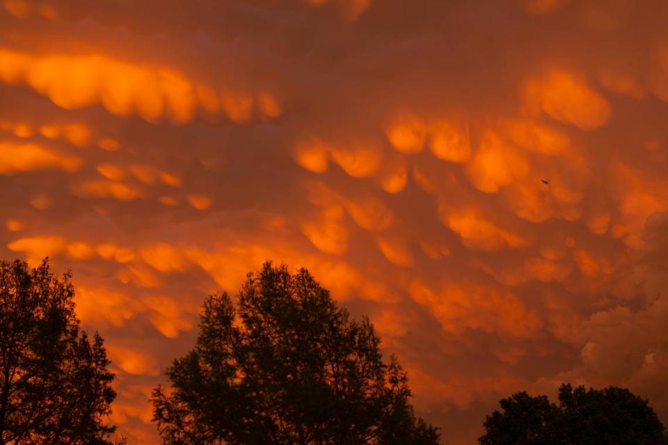 Mammatus clouds, which are formed in tall thunderstorms, seen from west Wichita on Tuesday evening.