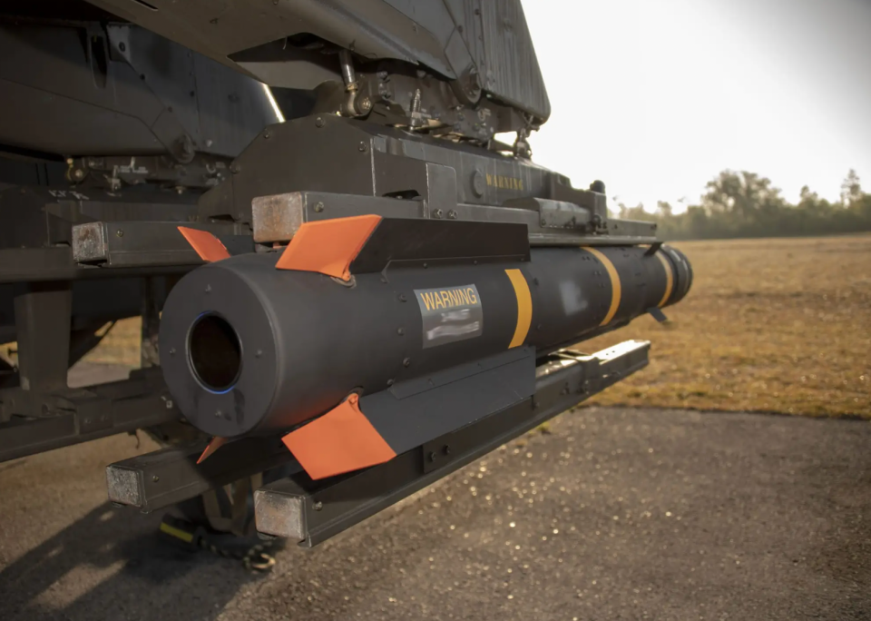 A JAGM loaded onto an AH-64E helicopter during the Initial Operational Test and Evaluation (IOT&E) phase for the missile. <em>U.S. Army</em>