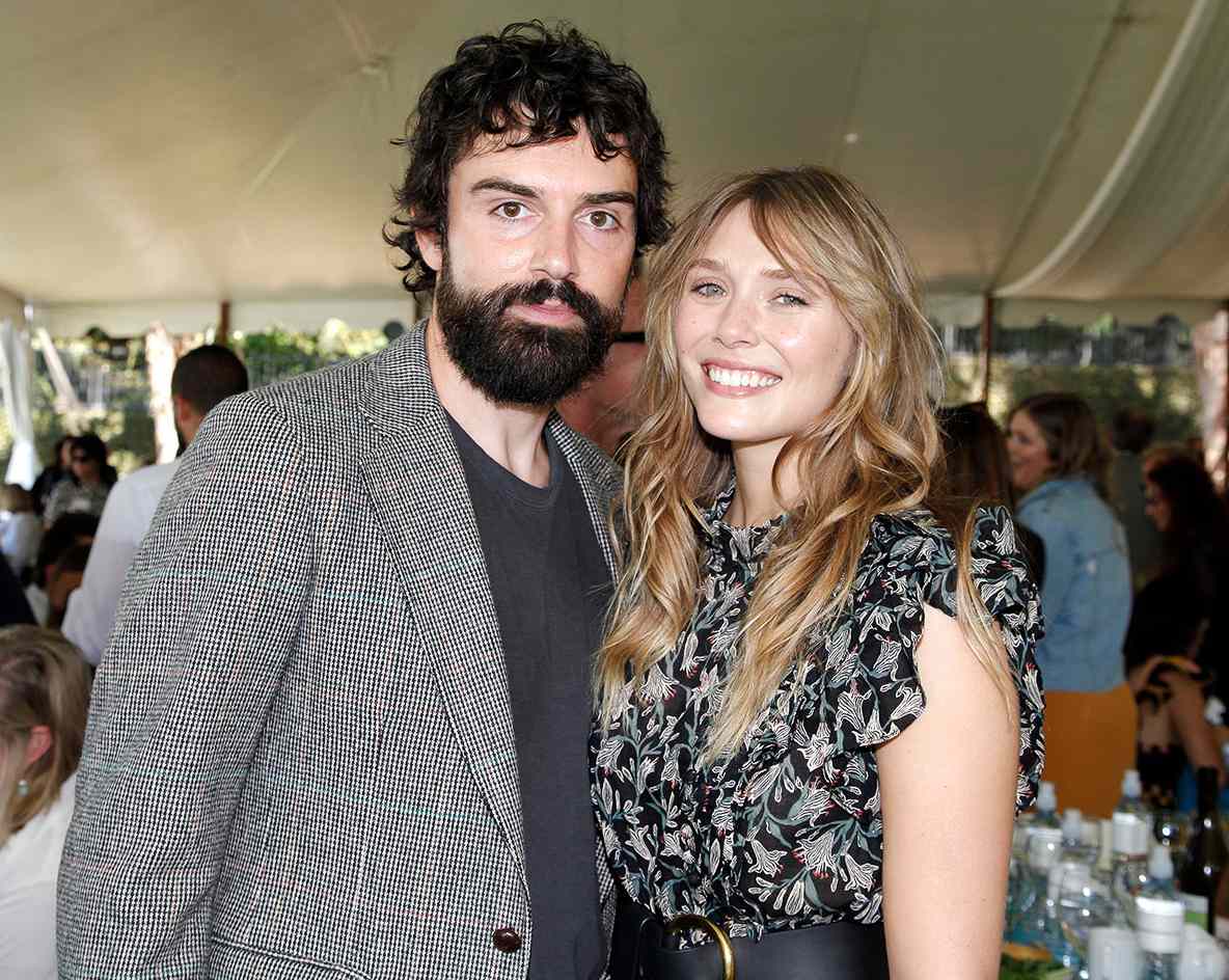 Robbie Arnett and Elizabeth Olsen attend the Rape Foundation Annual Brunch 2019 at a Beverly Hills Private Estate on October 06, 2019 in Beverly Hills, California.