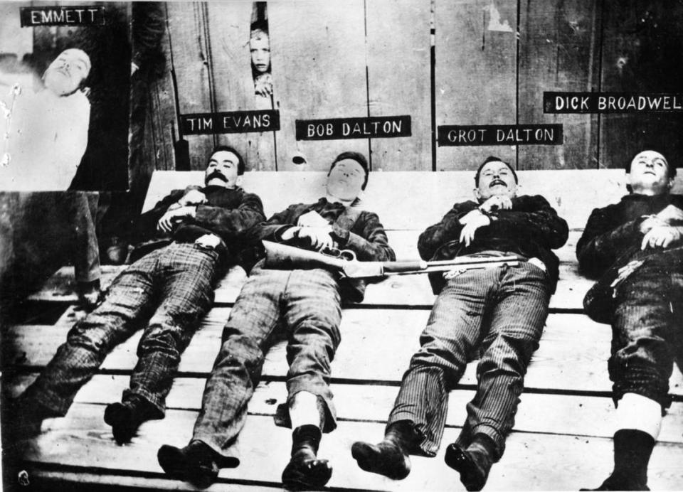 Slain members of the notorious Dalton Gang, are shown after being shot during a failed bank robbery October 2, 1892, in Coffeeville, Kansas. From left to right are Tim Evans, Bob Dalton, Grat Dalton and Dick Broadwell. The inset shows gang member Emmett Dalton, who survived the 23 slugs from the gunfight and served 15 years in prison. Photo reprinted with permission from the Annie R. Mitchell History Room, Tulare County Library, Visalia, California