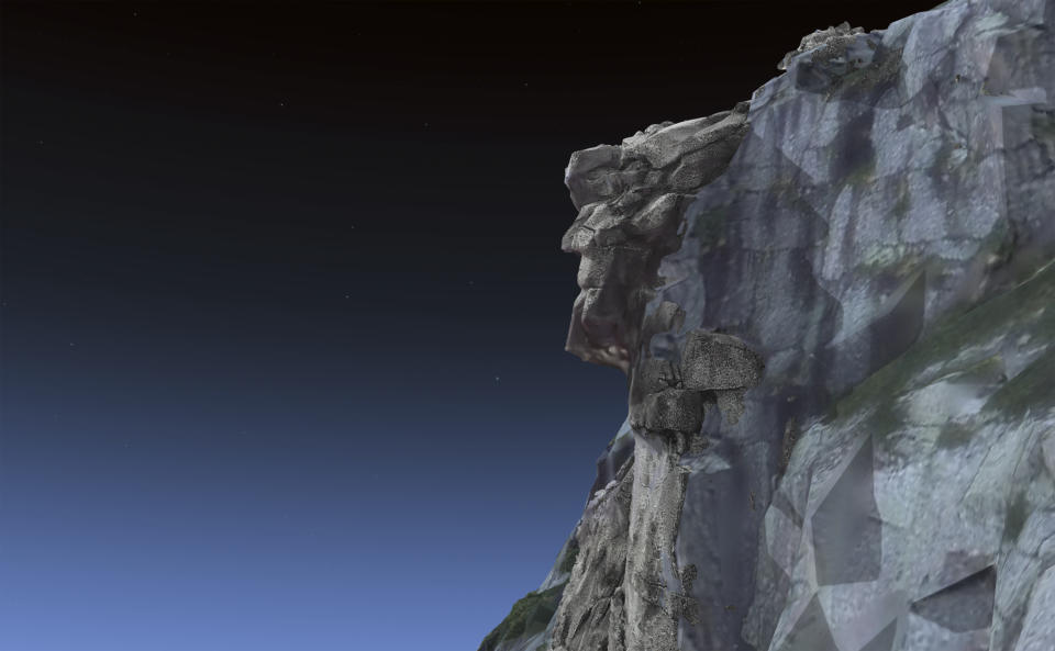 In this image taken on April 28, 2023, in Hanover, New Hampshire, an interactive 3D model of the state's Old Man of the Mountain is shown back on Cannon Cliff in Franconia Notch. It's been 20 years since the granite profile collapsed into pieces. The rubble was discovered on May 3, 2003. (Matthew Maclay via AP)