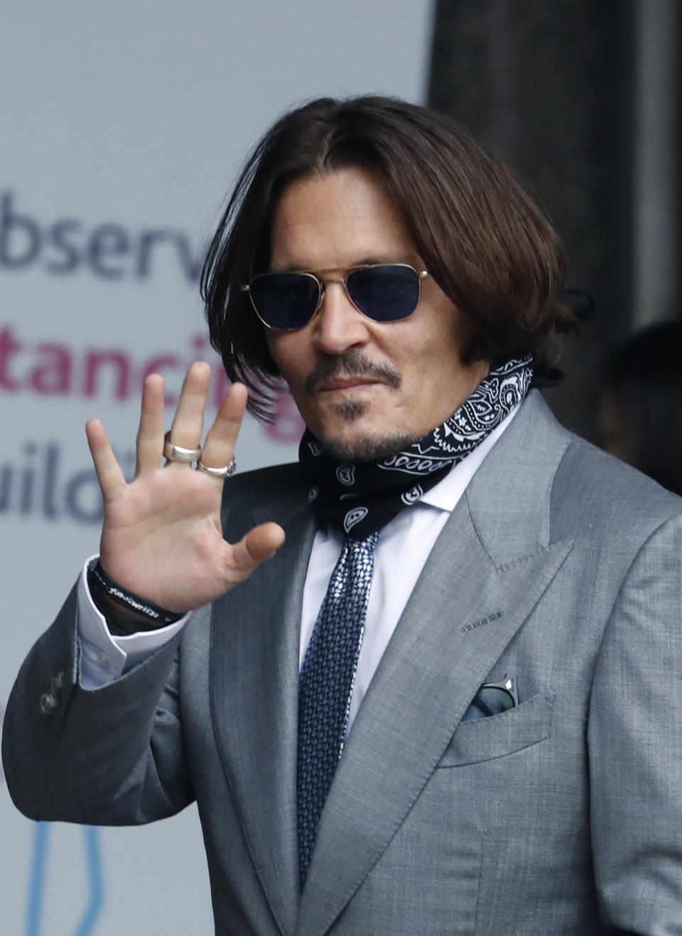 Actor Johnny Depp arrives at the High Court in London, Thursday, July 16, 2020. Depp is suing News Group Newspapers, publisher of The Sun, and the paper’s executive editor, Dan Wootton, over an April 2018 article that called him a “wife-beater.” The Sun’s defense relies on a total of 14 allegations by his ex-wife Amber Heard of Depp’s violence. He strongly denies all of them. (AP Photo/Alastair Grant)