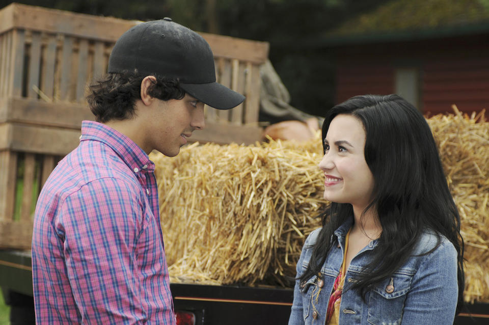 Joe Jonas and Demi Lovato on the set of <em>Camp Rock 2: The Final Jam</em>, released in 2010. (Photo: Disney)