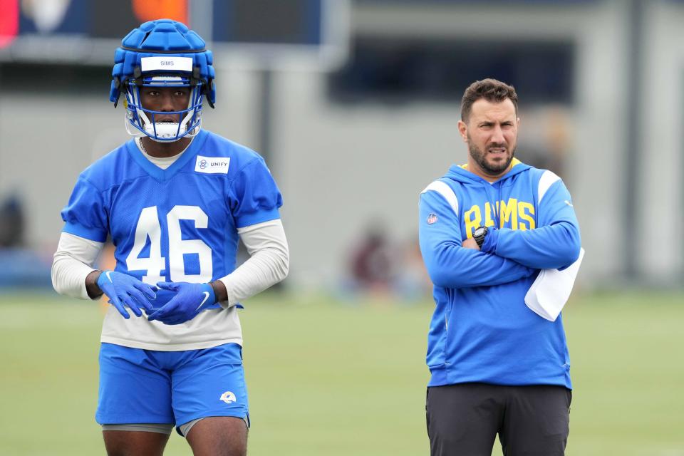 Jun 14, 2023; Thousand Oaks, CA, USA; Los Angeles Rams tight ends coach Nick Caley and tight end Christian Sims (46) during minicamp at Cal Lutheran University. Mandatory Credit: Kirby Lee-USA TODAY Sports