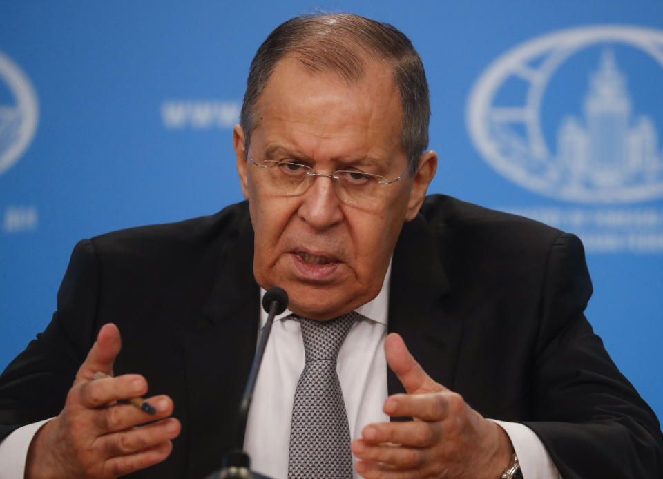Russian Foreign Minister Sergey Lavrov gestures while speaking during his annual news conference in Moscow, Russia, Friday, Jan. 14, 2022. (Maxim Shipenkov/Pool Photo via AP)