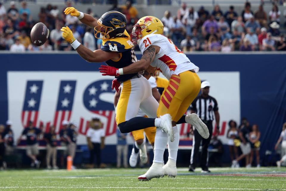 Apr 15, 2023; Memphis, TN, USA; Philadelphia Stars defensive back Cody Brown (21) breaks up a pass intended for Memphis Showboats wide receiver/linebacker Vinny Papale (13) during the second half at Simmons Bank Liberty Stadium. Mandatory Credit: Petre Thomas-USA TODAY Sports