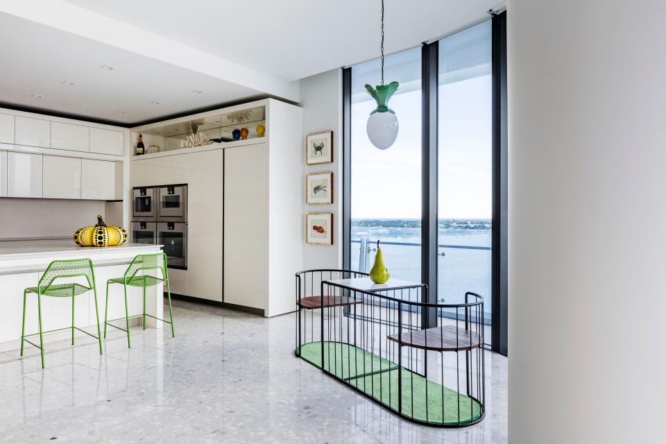 Beata Heuman’s Dodo Egg pendant is suspended in the kitchen.