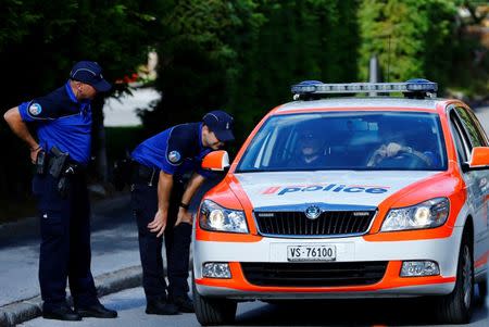 Police officers are seen ahead of peace talks on divided Cyprus under the supervision of the United Nations in the alpine resort of Crans-Montana, Switzerland June 28, 2017. REUTERS/Denis Balibouse