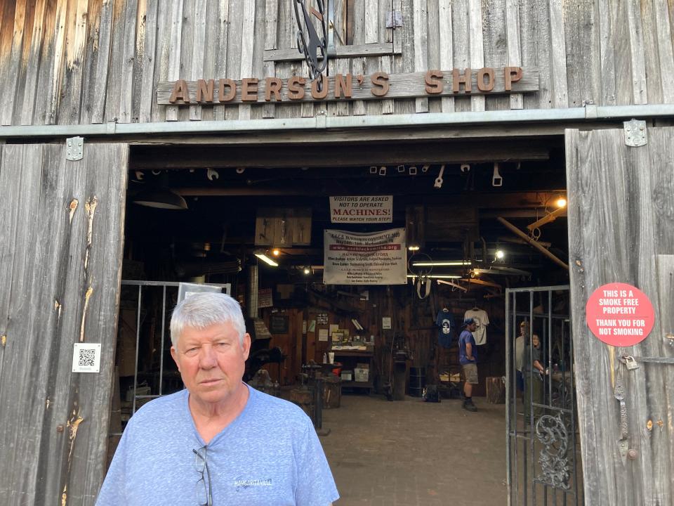Tom Padgett, president of the Rutherford County Blacksmiths Association, poses where the 70-member club meets to work on projects at Cannonsburgh Village in downtown Murfreesboro.