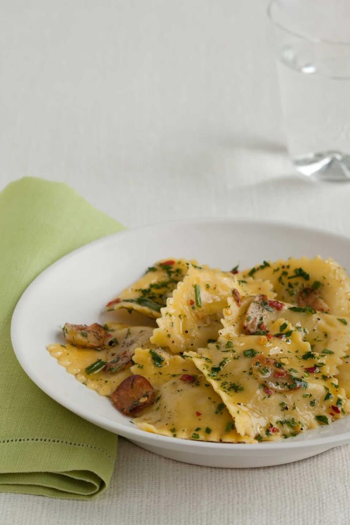 <p>For a restaurant-quality Italian meal that will be ready in minutes, toss store-bought four-cheese ravioli in olive oil kicked up with garlic, crushed red pepper flakes, chives and parsley.</p><p><a href="https://www.womansday.com/food-recipes/food-drinks/recipes/a11189/ravioli-garlic-herb-oil-recipe-122641/" rel="nofollow noopener" target="_blank" data-ylk="slk:Get the Ravioli with Garlic-Herb Oil recipe." class="link rapid-noclick-resp"><em>Get the Ravioli with Garlic-Herb Oil recipe.</em></a></p>