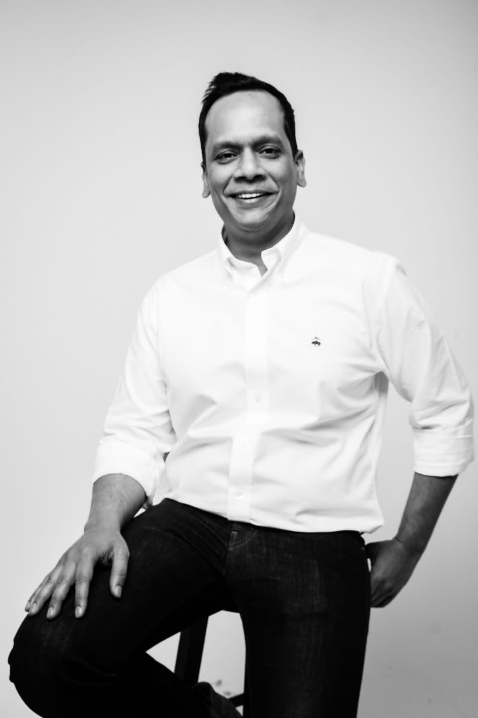 a black and white photo of swimswear designer vivek agarwal of ookioh