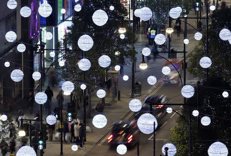 Oxford Street is illuminated after singer Cheryl Fernandez-Versini switched on the Oxford Street Christmas Lights in London November 6, 2014. REUTERS/Luke MacGregor