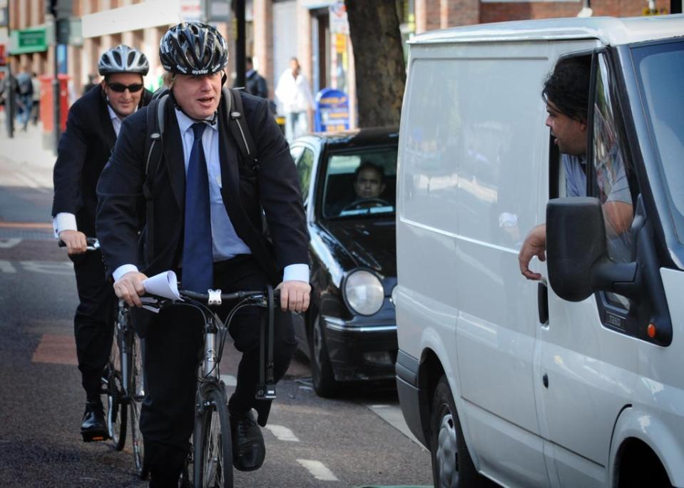 Boris Johnson with Guto Harri (Stefan Rousseau/PA) (PA Archive)