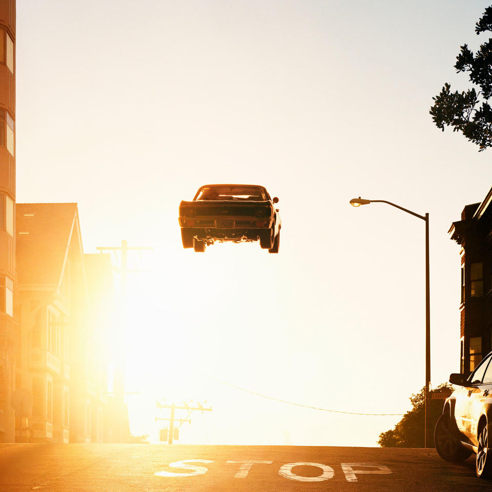 <p>Noe Valley, 2012/2017. “When I started this series, I was inspired by the way a car can steal the show. Think of iconic car chases in films — they are often about spectacle, and have little to do with advancing a narrative. Yet the most vivid images are often the ones that we remember.I think of these cars as dead-end technologies, high-performance machines that serve no useful function, and blatantly flaunt their own obsolescence. It seems fitting, then, that they remain suspended, light splashing over their lacquered hoods, reflecting the spirit and attitude of their time.”(© Matthew Porter courtesy Aperture) </p>