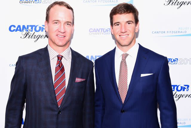 Dave Kotinsky/Getty Images for Cantor Fitzgerald Peyton Manning and Eli Manning