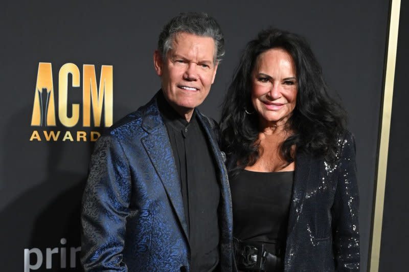 Randy Travis (L) and Mary Davis attend the Academy of Country Music Awards in 2023. File Photo by Ian Halperin/UPI