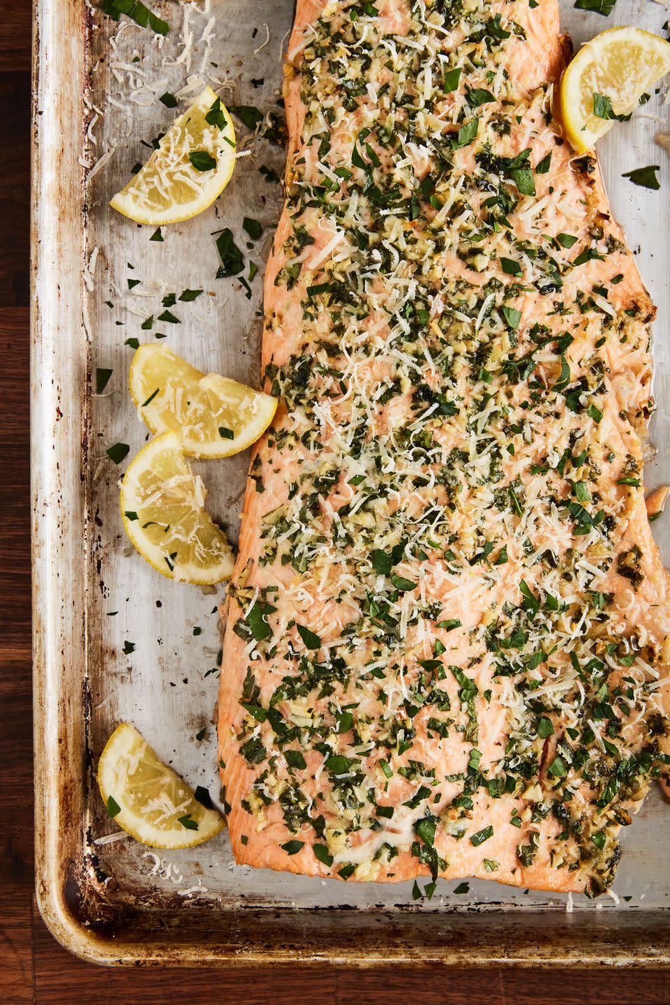 <p>We love <a href="https://www.delish.com/cooking/recipe-ideas/recipes/a55315/best-baked-salmon-recipe/" rel="nofollow noopener" target="_blank" data-ylk="slk:cooking salmon in the oven;elm:context_link;itc:0;sec:content-canvas" class="link ">cooking salmon in the oven</a> as one big fillet. It's the easiest way to prepare it and serving it always looks impressive.</p><p>Get the recipe from <a href="https://www.delish.com/cooking/recipe-ideas/recipes/a50778/garlic-parmesan-salmon-recipe/" rel="nofollow noopener" target="_blank" data-ylk="slk:Delish;elm:context_link;itc:0;sec:content-canvas" class="link ">Delish</a>.</p>