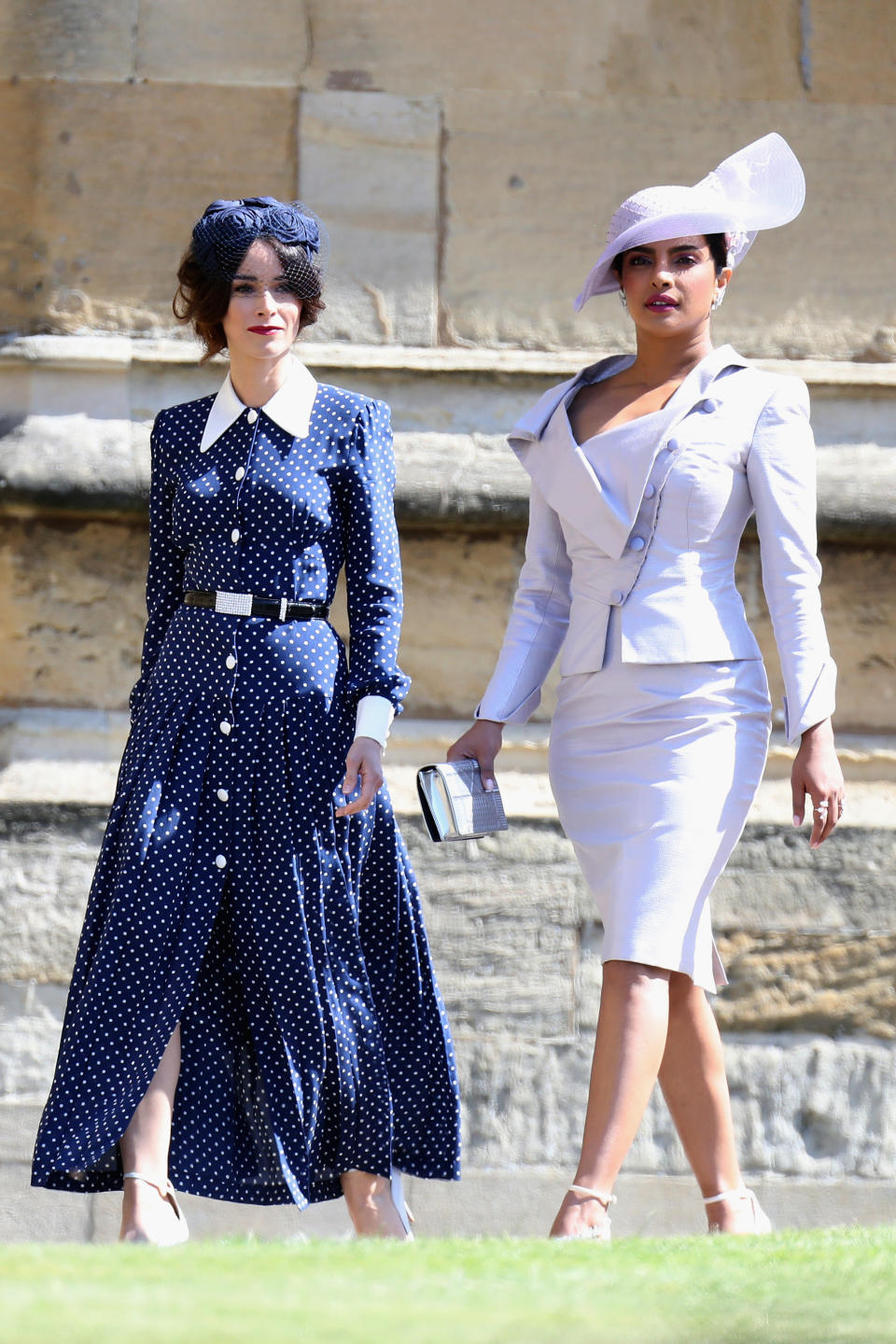 Priyanka Chopra famously attended the royal wedding – here, she is pictured with ‘Suits’ actress Abigail Spencer [Photo: Getty]