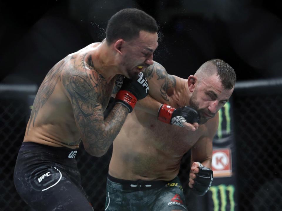 Alexander Volkanovski (right) and Max Holloway will clash for the featherweight title for the third time (Getty Images)