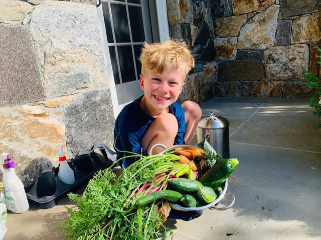 <p>Jim Gaffigan Instagram</p> Michael Gaffigan helping his dad harvest vegetables in August 2020