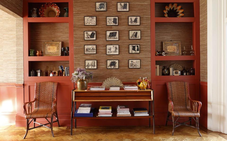 William Kentridge drawings are arranged above a 1950s Italian console in the dining room  - Credit: Alexander James 