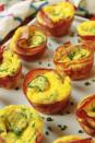 <p>These egg cups will definitely spice up your morning routine.</p><p>Get the recipe from <a href="https://www.redbookmag.com/cooking/recipe-ideas/recipes/a54022/jalapeno-popper-egg-cups-recipe/" rel="nofollow noopener" target="_blank" data-ylk="slk:Delish" class="link ">Delish</a>.</p>